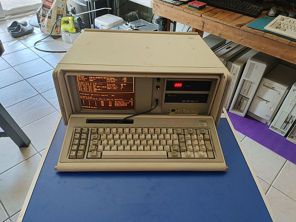 IBM 5155 sleeper. battery powered, celeron 500MHz, FreeDOS, floppy emulator, DVD burner. Still with CRT.