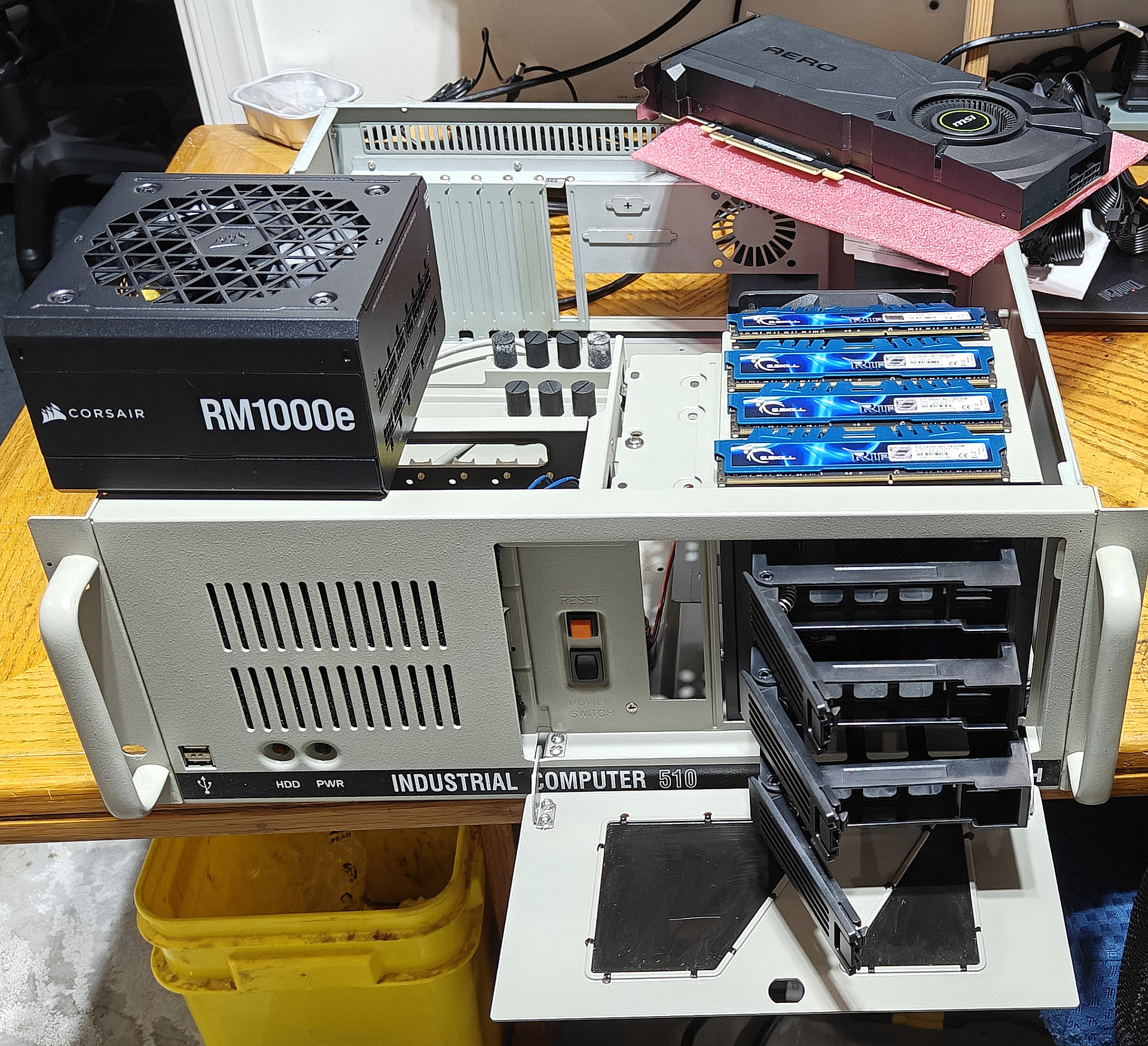 64GB DDR3 RAM, drive sleds, refurb 1kW Corsair PSU, and a 2080 ti GPU